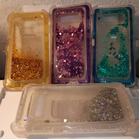 Plastic phone case with glitter. 6.5"x3"